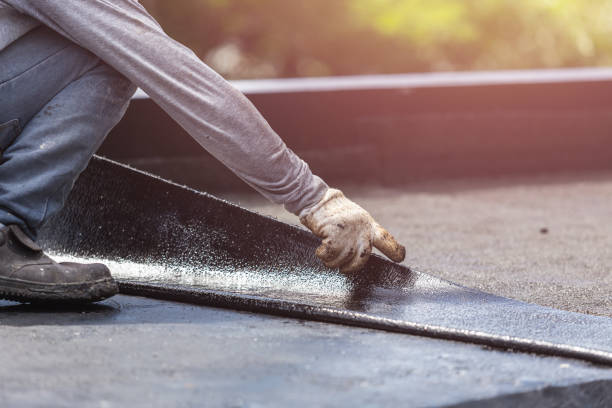 Professional Basement Waterproofing technician working in Hopewell, NJ